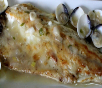 Lubina en salsa de almejas